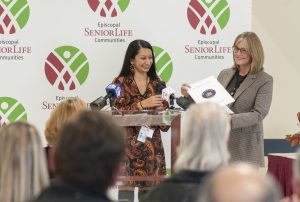 Lisa Marcello, President/CEO accepting a proclamation from Senator Samra Brouk's office