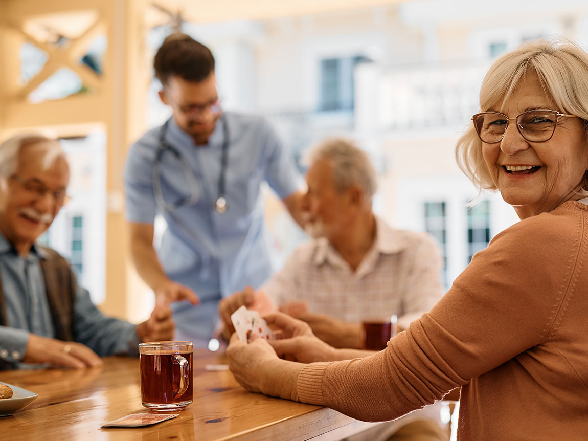 a group of seniors playing cards.